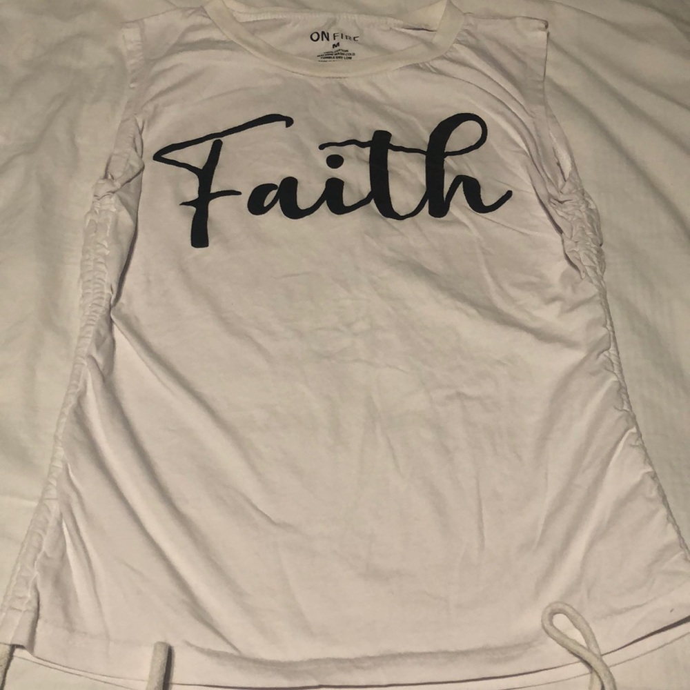 White with black lettering.Faith word is on the front